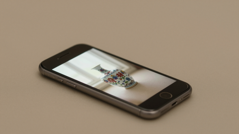 Phone comparing antique values with eBay sold listings and WorthPoint